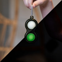 Fat Brain Simpl Dimpl Keychain, Glow in the Dark